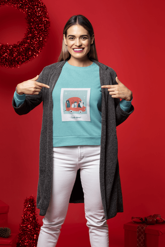 Christmas Themed Mockup Of A Woman Posing With A Sweatshirt