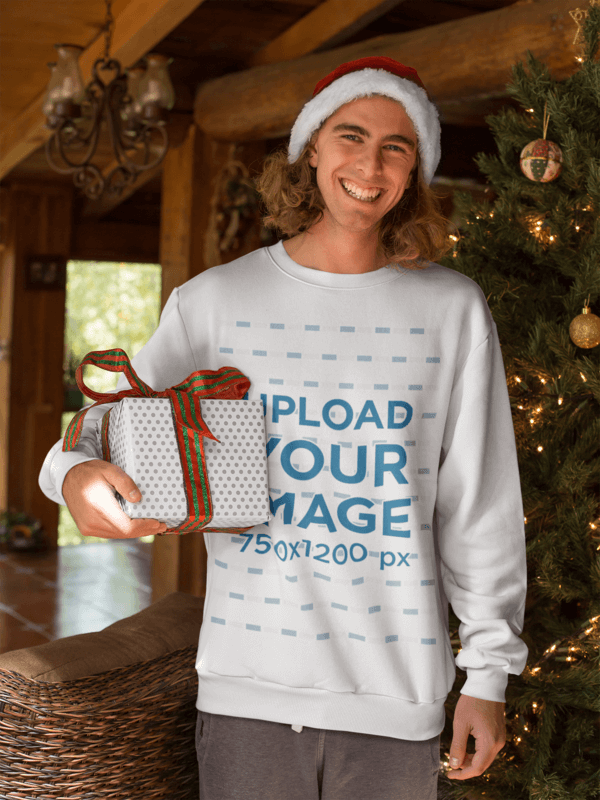 Crewneck Sweater Mockup Featuring A Man Holding His Christmas Present