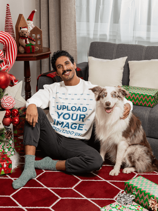 Gildan Sweatshirt Mockup Of A Man With His Dog In A Christmas Decorated Living Room