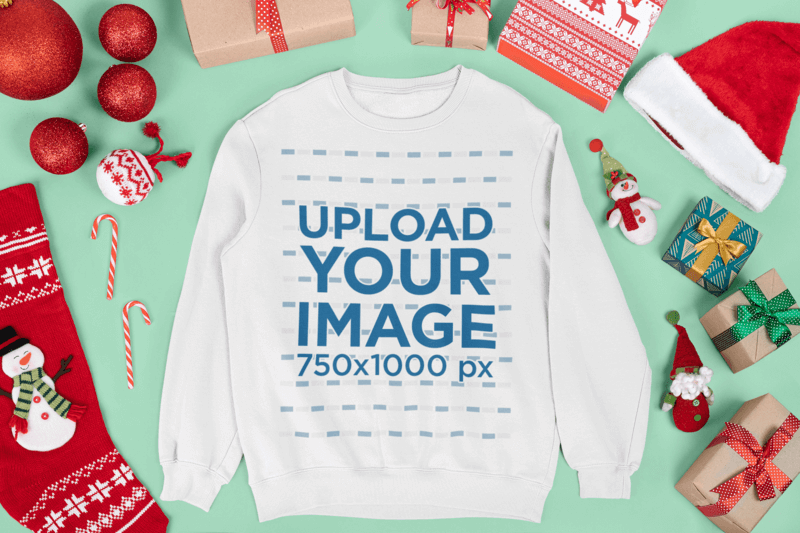 Mockup Of A Crewneck Sweatshirt Surrounded By Christmas Decorations And Gifts