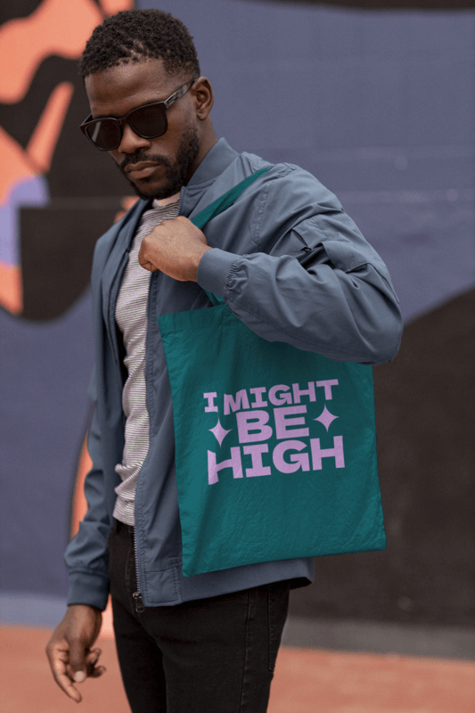 Mockup Of A Man With Sunglasses Carrying A Tote Bag