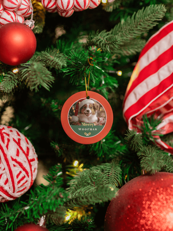 Print Mockup Featuring A Ceramic Ornament Hanging From A Christmas Tree