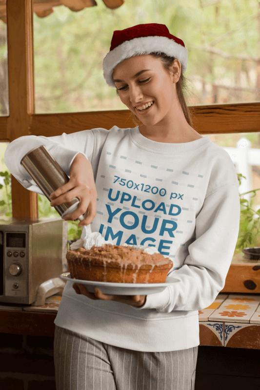 Sweatshirt Mockup Featuring A Woman Decorating Her Christmas Pie