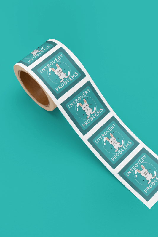 Branding Stickers Mockup Featuring A Cat Cartoon Design With A Green Backdrop