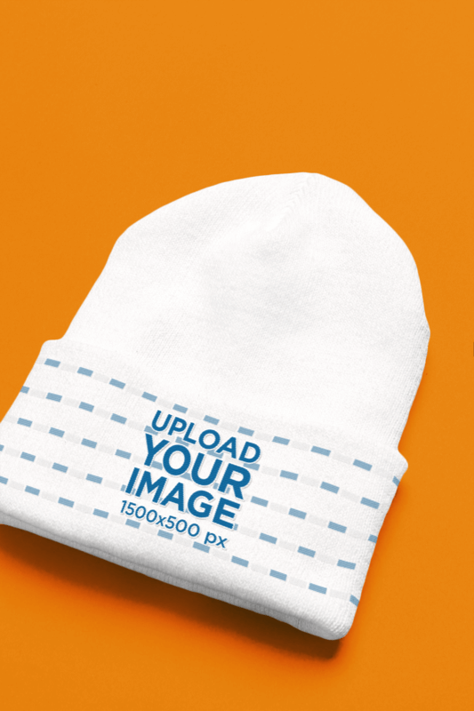 Mockup Of A Youpoong Beanie Lying Over An Orange Surface