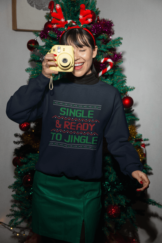 Ugly Christmas Sweater Themed Gildan Sweatshirt Mockup Of A Woman Taking A Picture With An Instant Camera