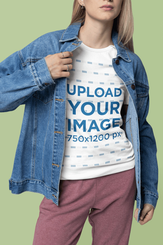 Mockup Of A Cropped Face Woman Wearing A Bella Canvas T Shirt With A Denim Jacket