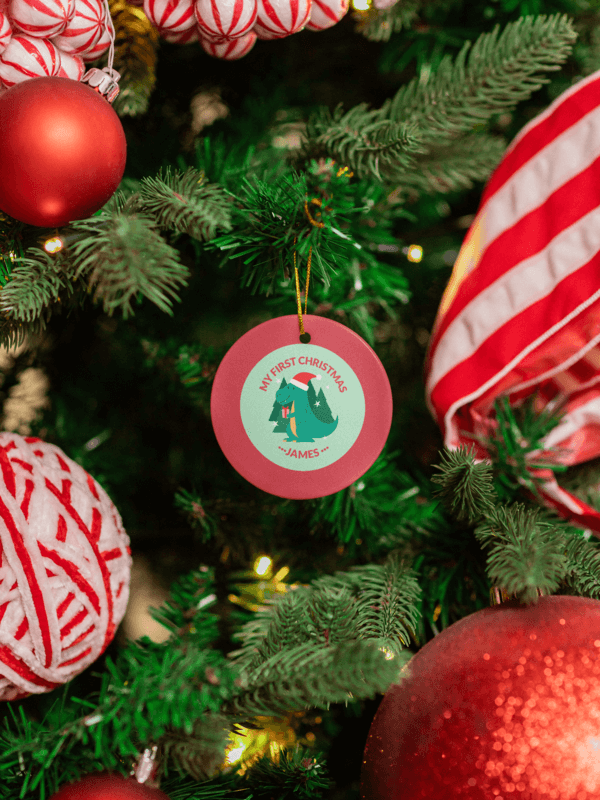 Print Mockup Featuring A Ceramic Ornament Hanging From A Christmas Tree