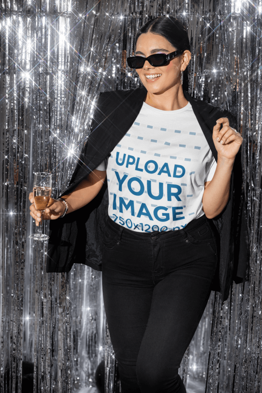 Bella Canvas Blank T Shirt Mockup Featuring A Cheerful Woman With A Glass Of Wine In A New Year's Party