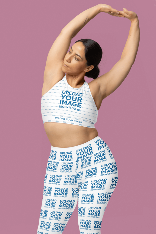 Fully Lined Sports Bra Mockup Featuring A Woman In High Waisted Yogga Leggings Stretching Her Arms