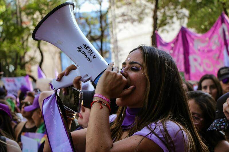 Photo Of A Woman At A Women's Day March By Pexels