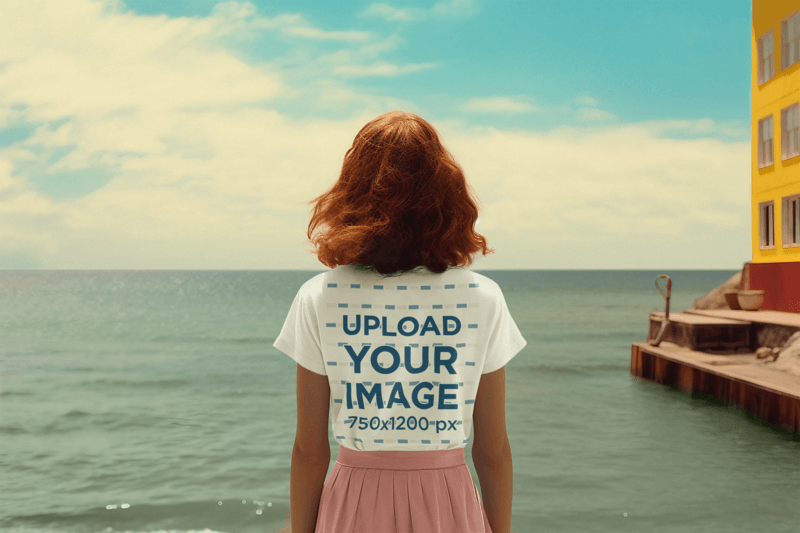 Wes Anderson Inspired T Shirt Mockup Of An AI Created Woman Standing In Front Of The Sea