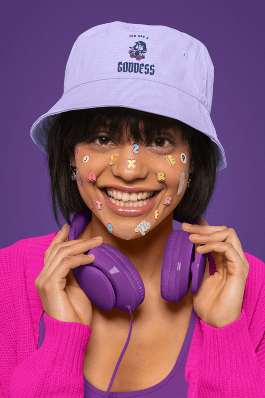 Closeup Mockup Of A Cheerful Woman Wearing A Bucket Hat With A Women's Day Quote