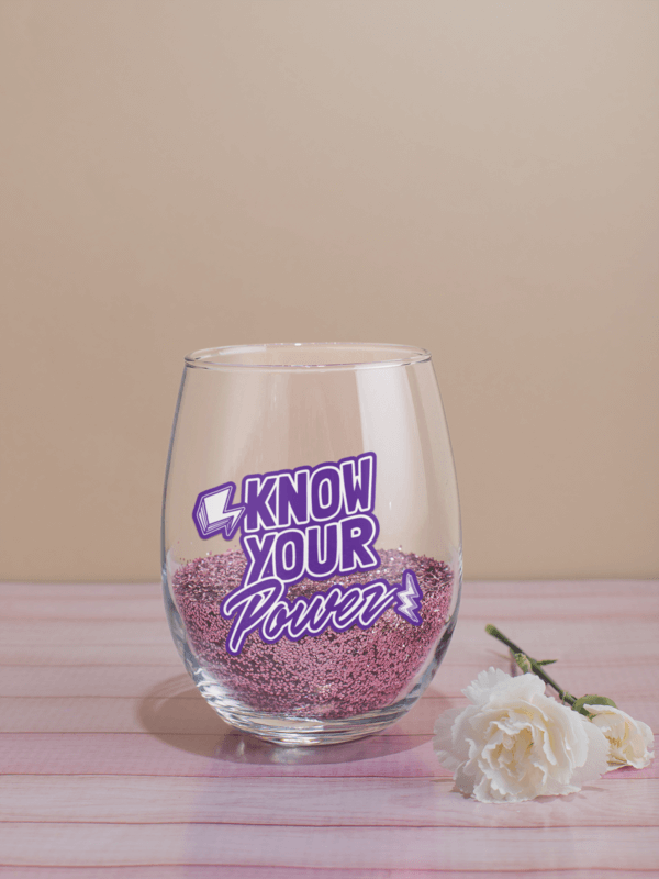 Stemless Wine Glass Mockup Featuring Pink Glitter And A White Carnation