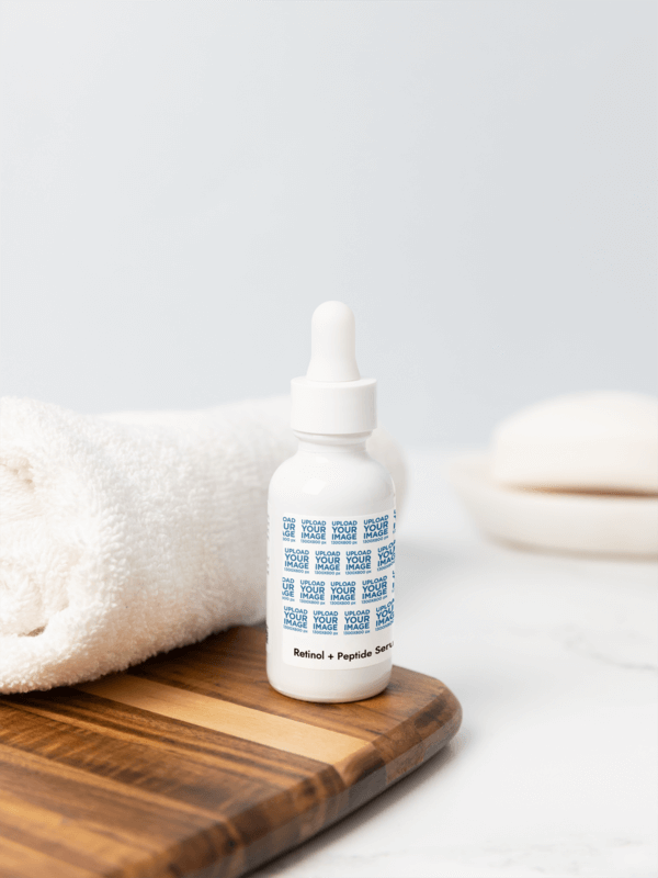 Printify Retinol And Peptide Face Serum Mockup Featuring A Nice Aesthetic Bathroom