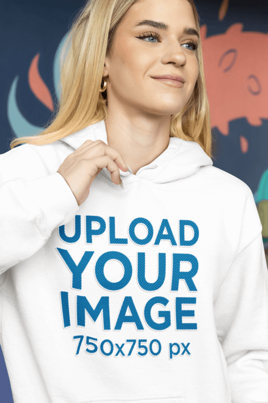 Mockup Of A Pretty Woman Wearing A Gildan Hoodie With Embroidered Elements