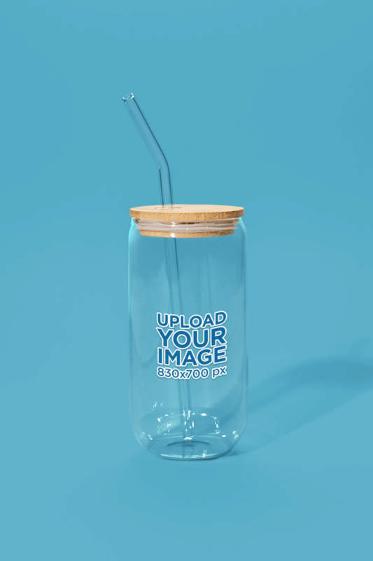 Mockup Of An Empty 16 Oz Can Glass Placed On A Blue Backdrop