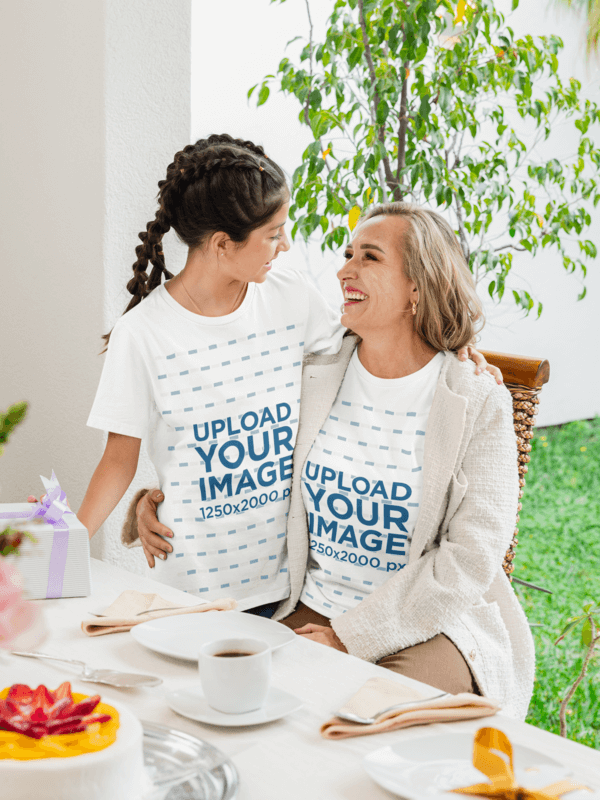Bella Canvas T Shirt Mockup Featuring A Girl Wearing A Bella Canvas 3001y Shirt And Celebrating Mother's Day With A Woman