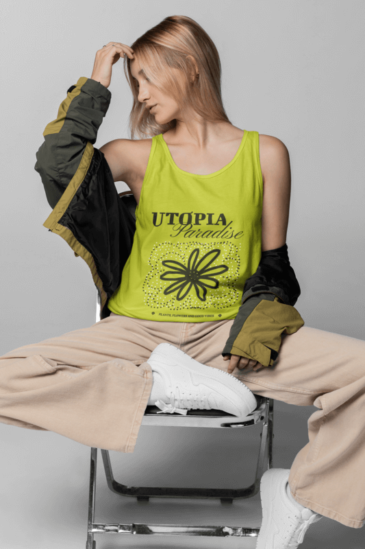 Mockup Of A Woman Sitting On A Chair In A Studio While Wearing A Bella Canvas 3480 Tank Top