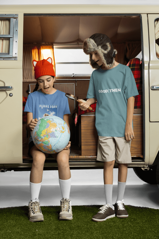 T Shirt Bella Canvas 3001y Mockup Of Two Siblings In A Camper Van Holding A Globe
