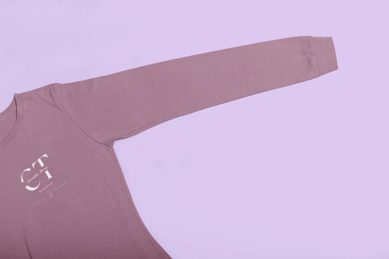 Closeup Mockup Of A Long Sleeve Tee Featuring A Bridesmaid Design Over A Solid Surface