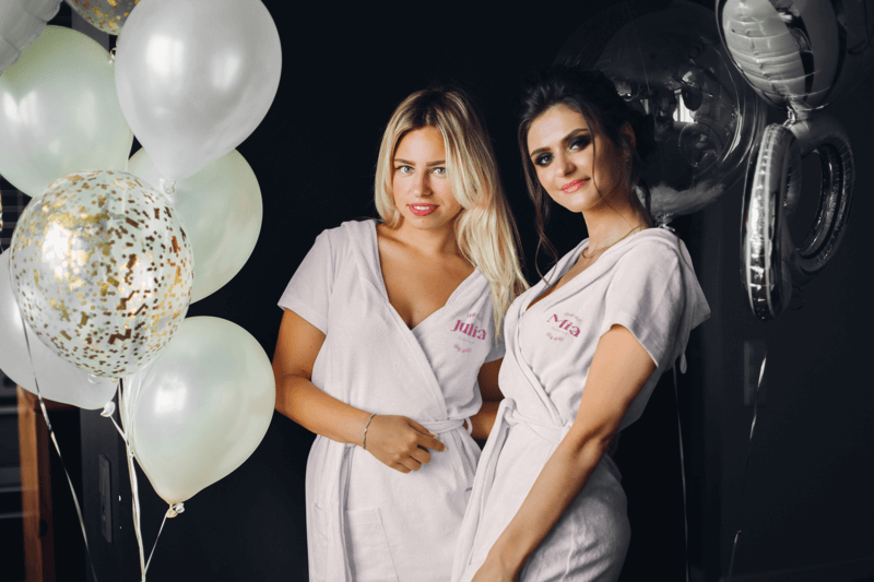 Robe Mockup Featuring Two Women Getting Ready For A Wedding