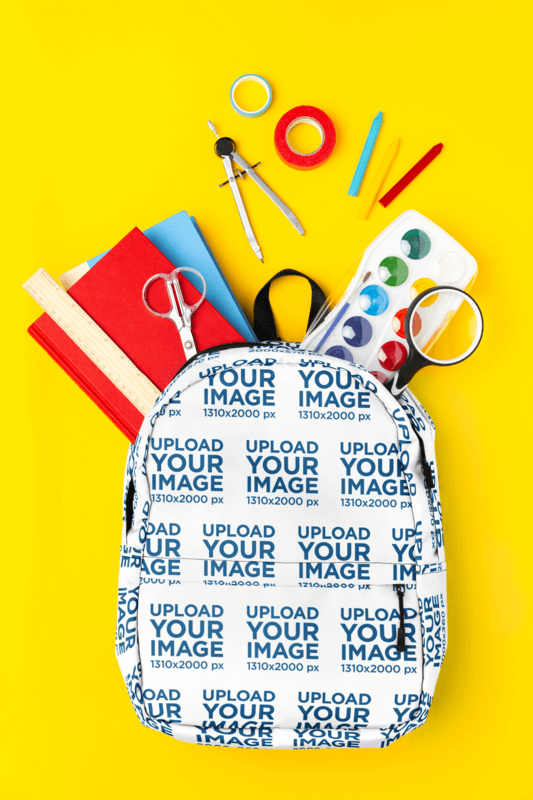 Mockup Of A Sublimated Backpack Filled With School Supplies
